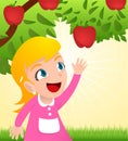 Girl grabbing an apple from a tree