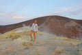 A girl on the Gray Hydrogen Volcano and Volcano Craters on Vulcano Island, Lipari, Italy. Sunset, Gas, Sulfur, Poisonous Pairs,