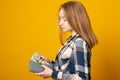 Girl with gray wallet full of money Royalty Free Stock Photo
