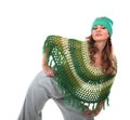 Girl in a green knit poncho