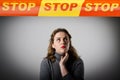 Girl in grey and STOP line. Royalty Free Stock Photo