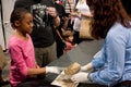 Girl Grimaces Touching Human Brain At Science Expo