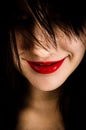 Girl with a grin on her face Royalty Free Stock Photo