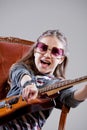 Girl with guitar and sunglasses Royalty Free Stock Photo