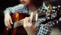 Girl guitarist plays Royalty Free Stock Photo