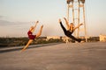 Girl and guy dancers perform a passionate dance together outdoors in nature Royalty Free Stock Photo