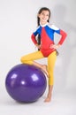 Girl with gym ball Royalty Free Stock Photo