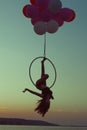 Girl gymnast doing tricks on ring. Royalty Free Stock Photo