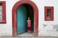 Girl in Half timbered house in a village in Alsace Royalty Free Stock Photo