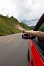 Girl hand at the car window Royalty Free Stock Photo