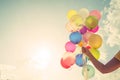 Girl hand holding multicolored balloons Royalty Free Stock Photo