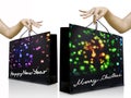 Girl hand pick up the holiday shopping bag Royalty Free Stock Photo