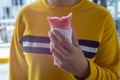 Girl hand holding strawberry icicle Royalty Free Stock Photo