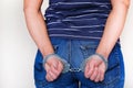 The girl in handcuffs at the police station. Arrested for misdemeanors Royalty Free Stock Photo