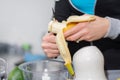 Fresh and Nutritious: Preparing Banana for Detox Smoothie Royalty Free Stock Photo