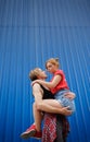 Modern and stylish hipsters couple on blue background, sunny portrait couple teenagers. Royalty Free Stock Photo