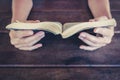 Girl hands holding book closeup - reading concept