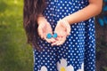 Girl hands holding a small butterfly Royalty Free Stock Photo