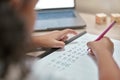 Girl hands, math and writing on paper, counting and homework with number, elearning and laptop in home. Child, learning Royalty Free Stock Photo