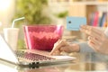 Girl hands paying media content with credit card and laptop