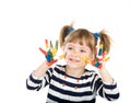 Girl with hands soiled in a paint. Royalty Free Stock Photo