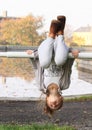 Girl hanging on banisters