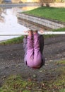 Girl hanging on banisters