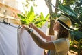 Girl hanging laundry on a clothes line Royalty Free Stock Photo