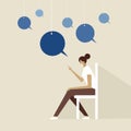 A person siting on chair with speech bubbles hanging on strings