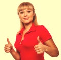 Girl happy woman young shows positive sign thumbs yes, in red sh