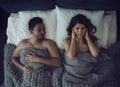 Girl has difficulty to sleep due to snore noise of the boyfriend. concept of discomfort and sleeplessness