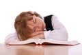 Girl has fallen asleep near the book Royalty Free Stock Photo