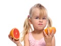 Girl has sour fruit face Royalty Free Stock Photo