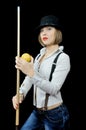 Girl in hat with billiard cue Royalty Free Stock Photo