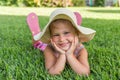 Girl with a hat lying on the grass Royalty Free Stock Photo