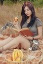 Student girl on a picnic Royalty Free Stock Photo