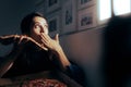 Stressed Woman Eating at Night Feeling Sick and Nauseated