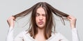 Girl having a bad hair. Bad hairs day. Frustrated woman having a bad hair. Woman having a bad hair, her hair is messy Royalty Free Stock Photo