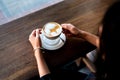 Girl having coffee in the bar Royalty Free Stock Photo