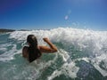 Girl Having Fun In Large Sea Waves Royalty Free Stock Photo