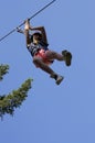 Girl having fun on a rope park adventure