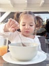 Girl having a healthy breakfast outdoors Royalty Free Stock Photo