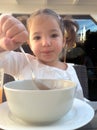 Girl having a healthy breakfast outdoors Royalty Free Stock Photo