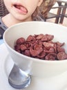 Girl having a healthy breakfast outdoors Royalty Free Stock Photo