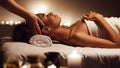 Girl having massage and enjoying aroma therapy in spa