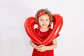 Girl with heart, beautiful little girl holding big balloon heart