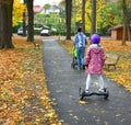 Girl in helmet riding on the hoverboard in the park