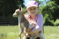 Girl with Her Baby Goat