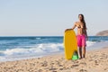 Girl with her bodyboard Royalty Free Stock Photo