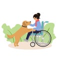 Girl in wheelchair plays witn her dog Royalty Free Stock Photo